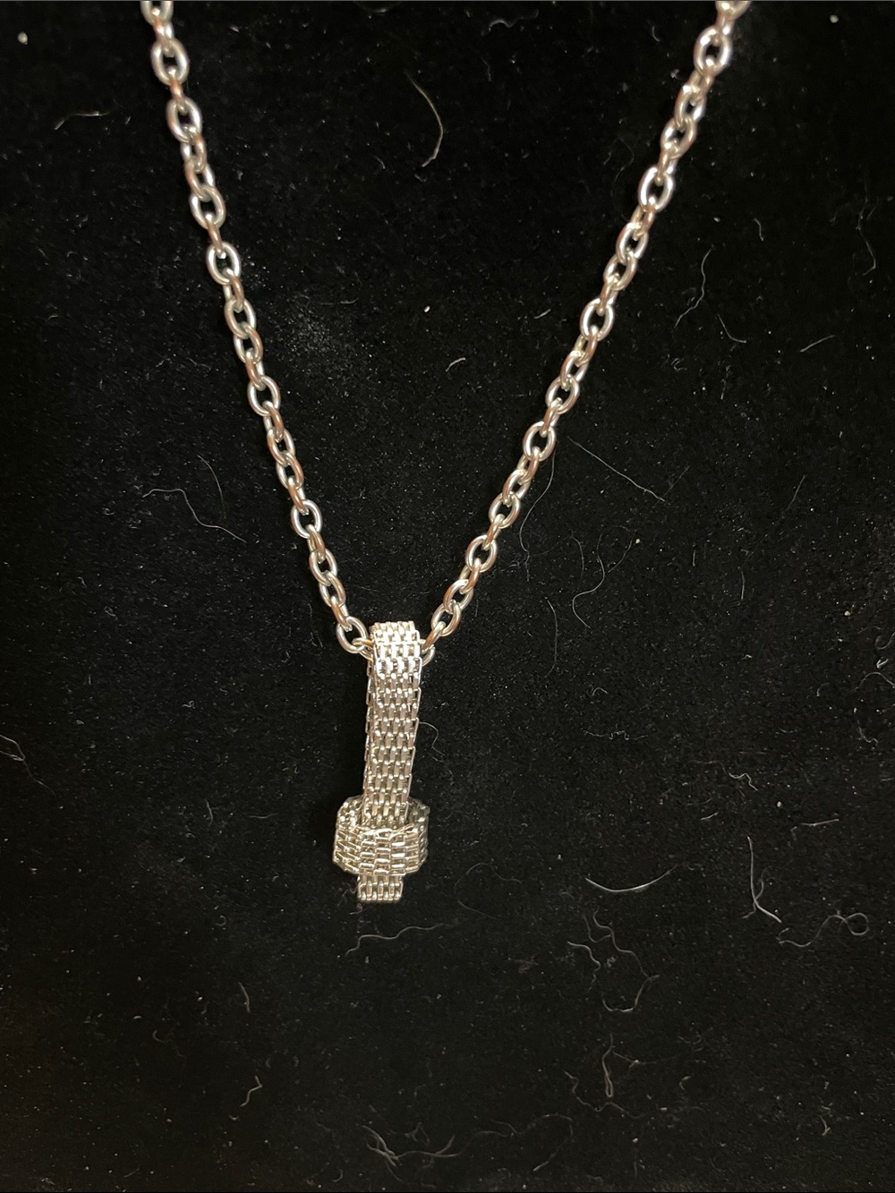 Cookie Lee Silver Knot Drop Necklace.